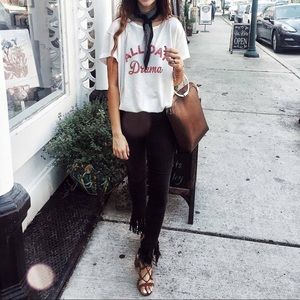 Black skinny jeans with fringe ankle